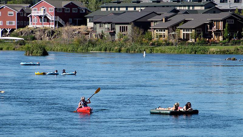 Paddlers on the River Deschutes in downtown Bend.