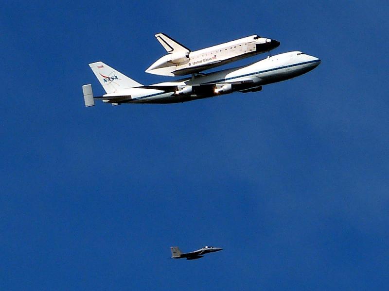 The space shuttle Endeavor piggy backs on NASA&#039;s 747.