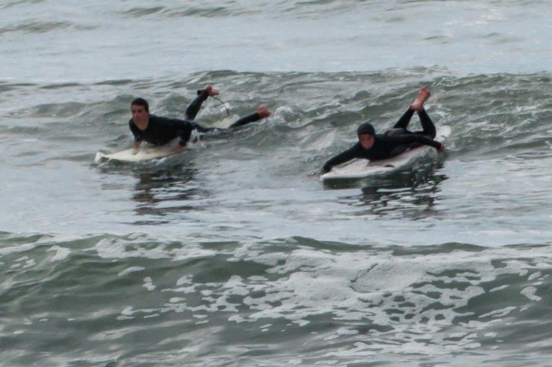 Simon and Henry surfing at Pacifica